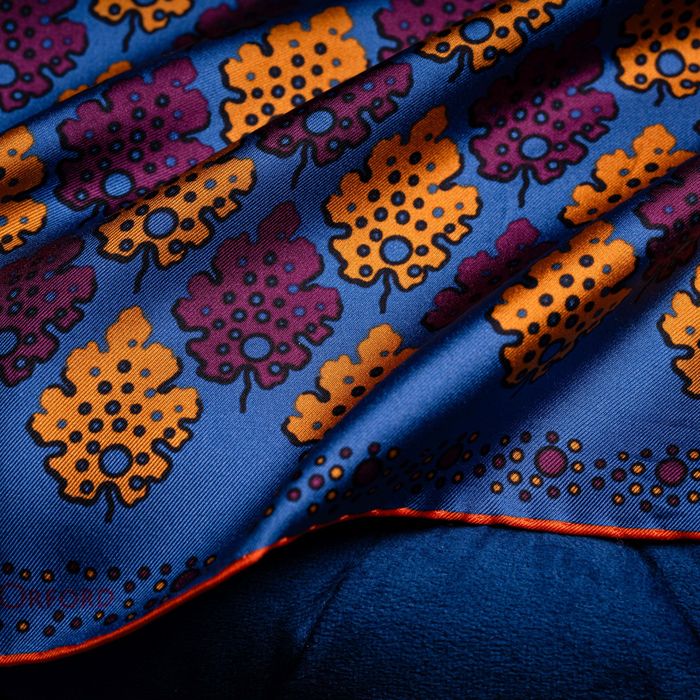 'Motif' in blue, burgundy & gold