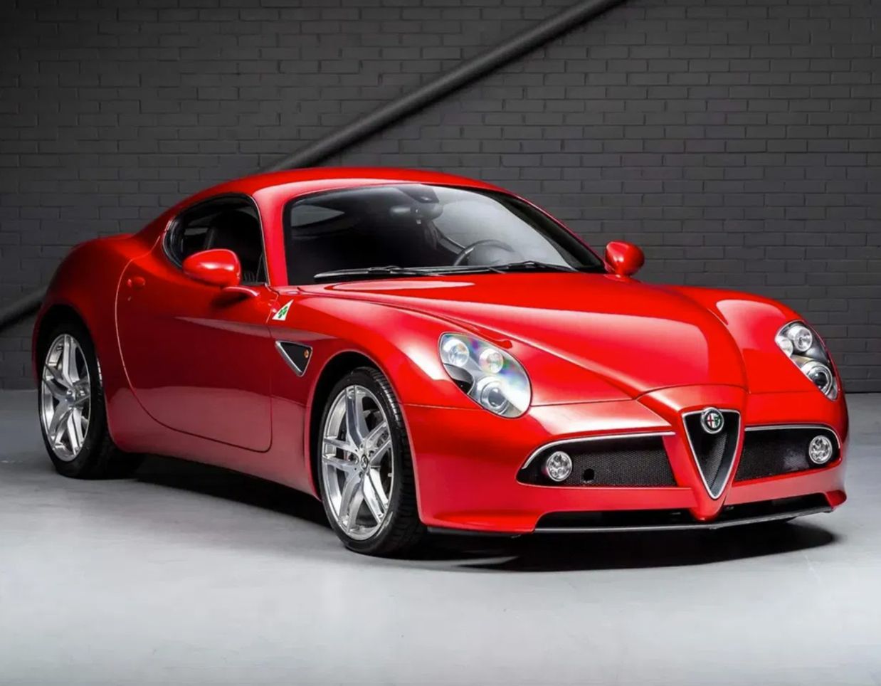 Red Alfa Romeo 8C Competizione sports car Italian luxury coupe