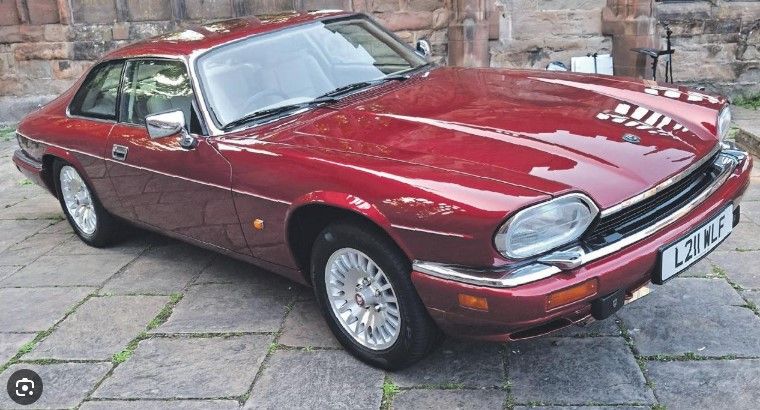 Red Jaguar XJS luxury V12 coupe with lattice alloy wheels and registration L211 WLF.