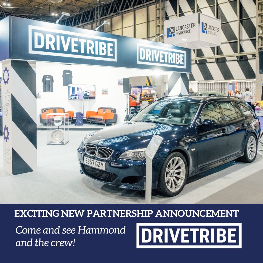 Drivetribe and Lancaster Insurance Classic Motor Show event booth featuring a blue BMW M5 touring car. The image announces an 'Exciting New Partnership' and invites visitors to 'Come and see Hammond and the crew'.