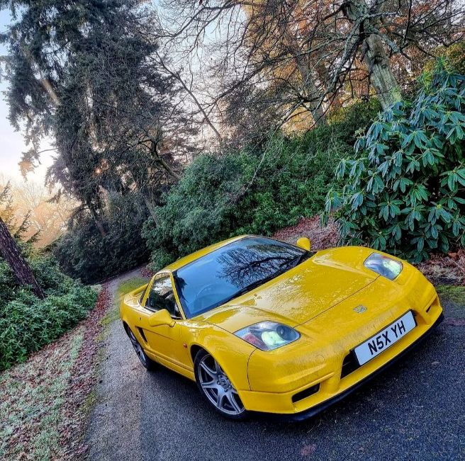 yellow Honda NSX sports car facelift fixed headlights outdoors classic first generation