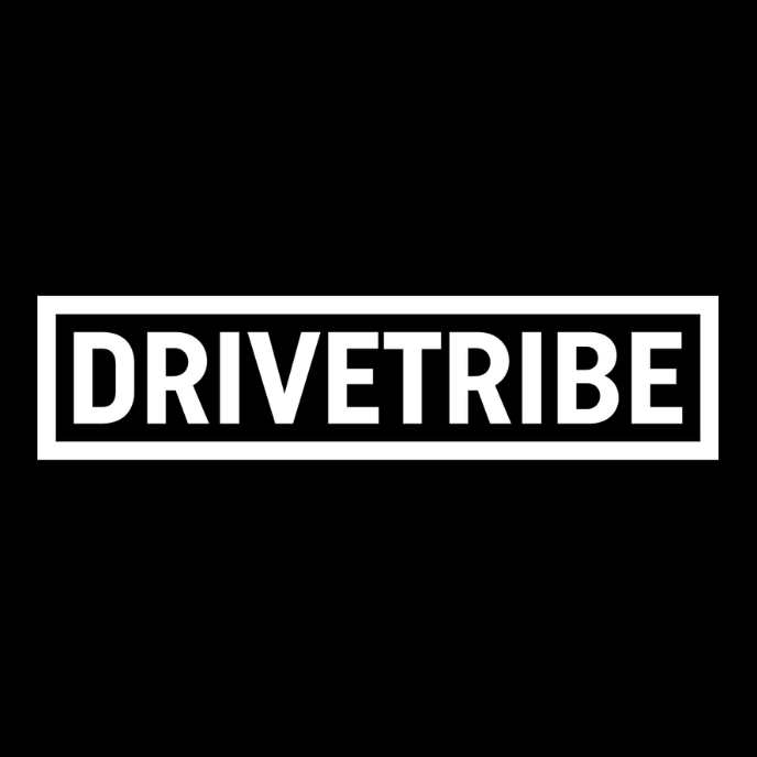 The brand logo for DRIVETRIBE, featuring the name in white letters inside a white rectangle on a black background.