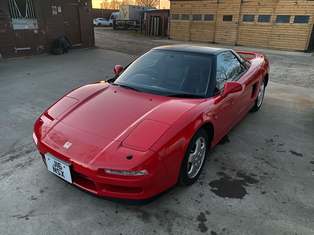 red Honda NSX sports car black roof pre-facelift pop-up headlights classic generation