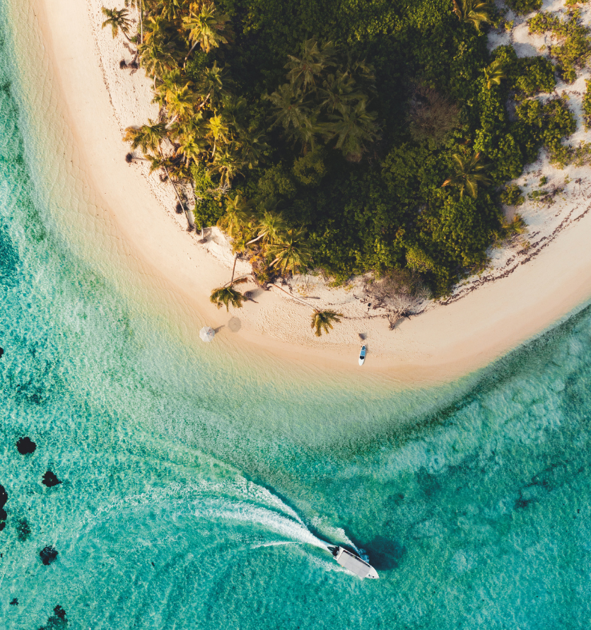 boat in water on beach