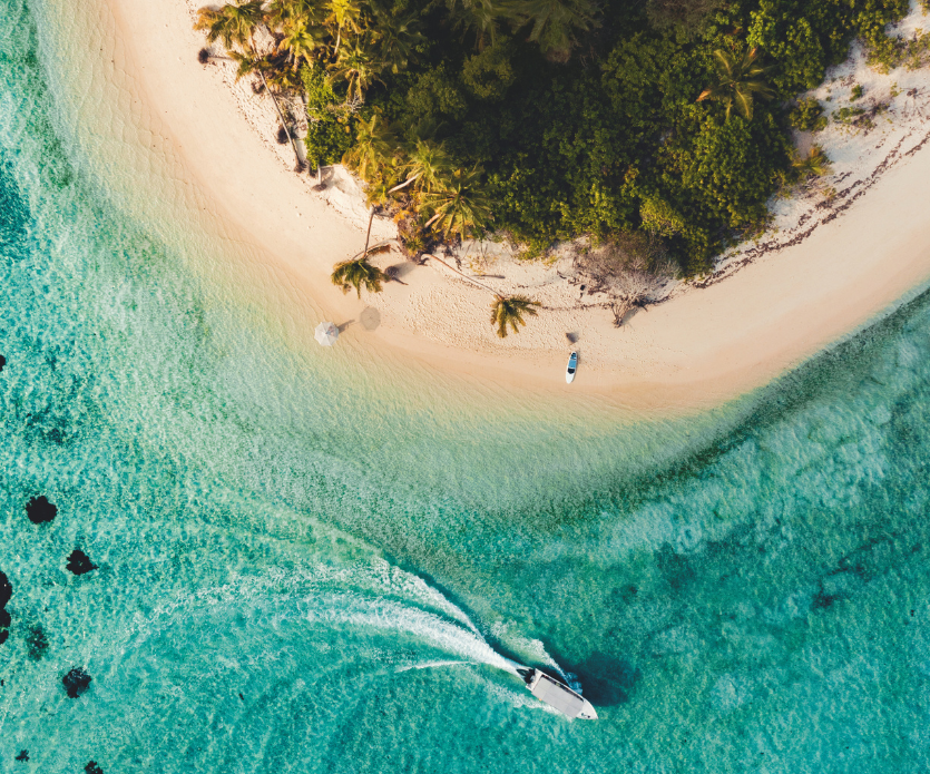 boat in water on beach