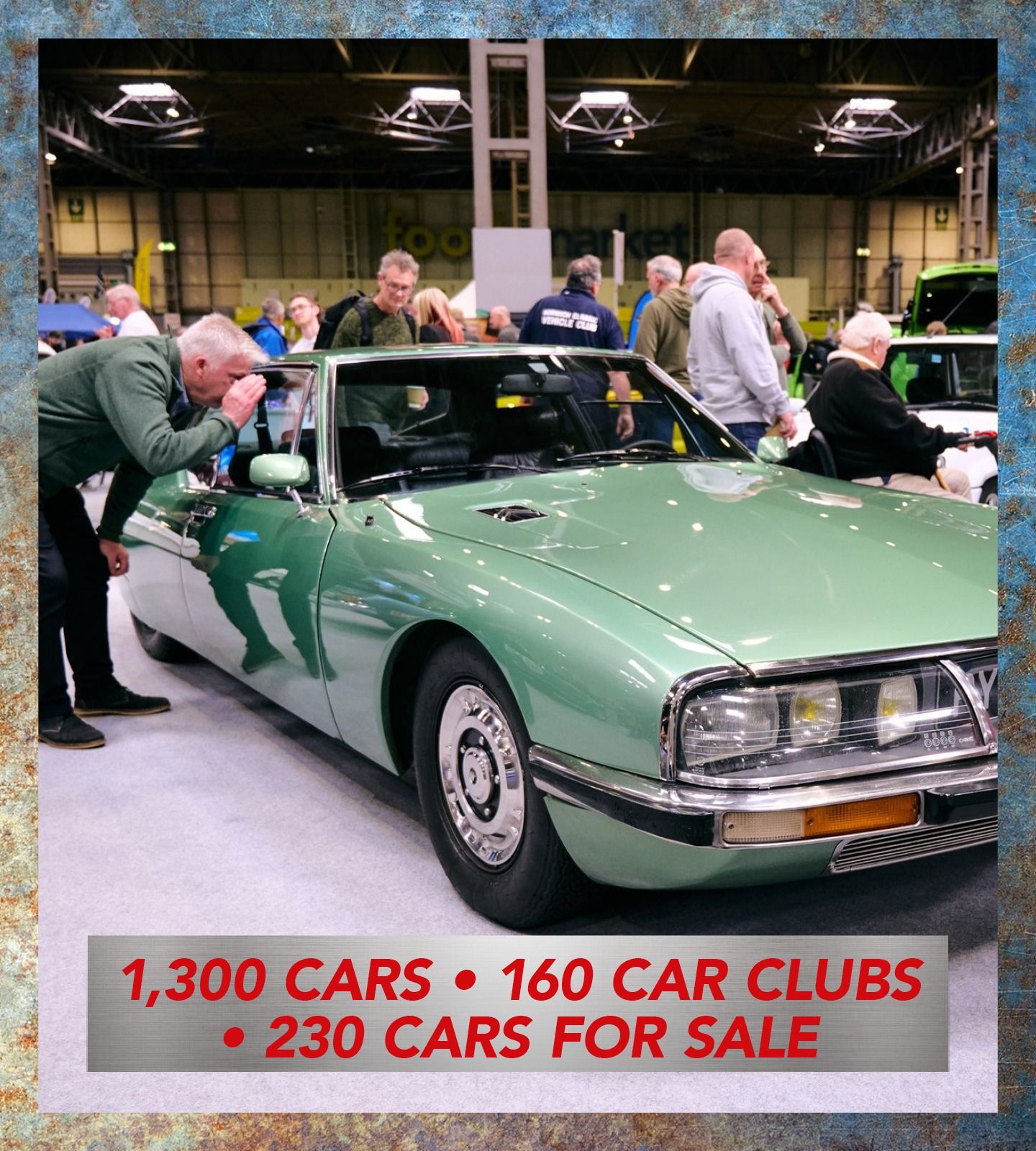 A mint condition green Citroen SM on display at a classic car show featuring 1,300 cars, 160 car clubs, and 230 cars for sale.