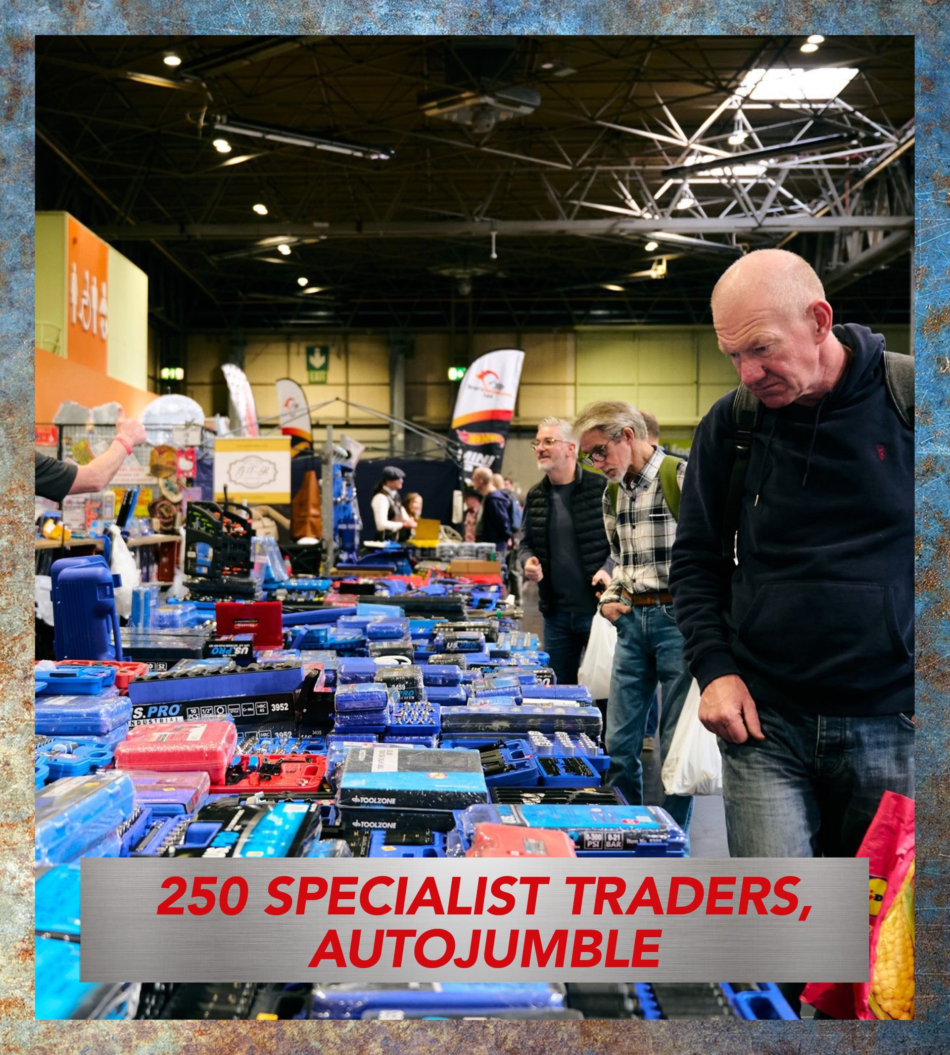 Crowded autojumble and tool market at a classic car show with 250 specialist traders selling automotive parts and accessories.