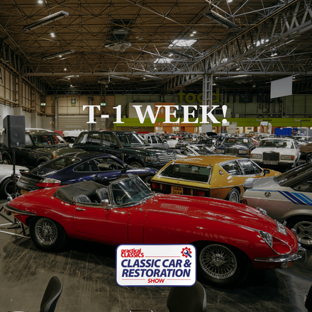 Red Jaguar E-Type at the Practical Classics Classic Car & Restoration Show with T-1 Week countdown.