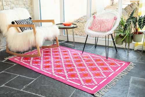 Cerise pink and orange handwoven rug