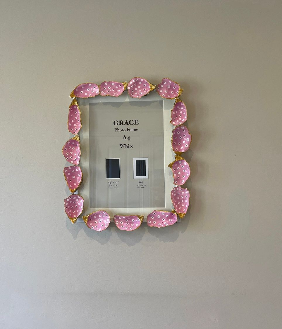 Oyster shell decorated photo frame