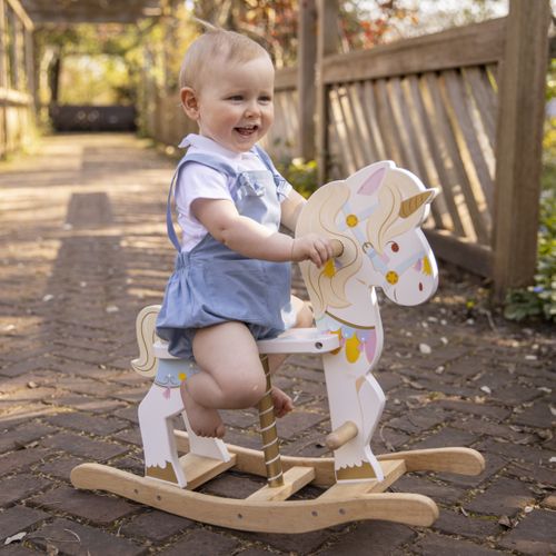 Wooden Rocking Unicorn & Other Toys