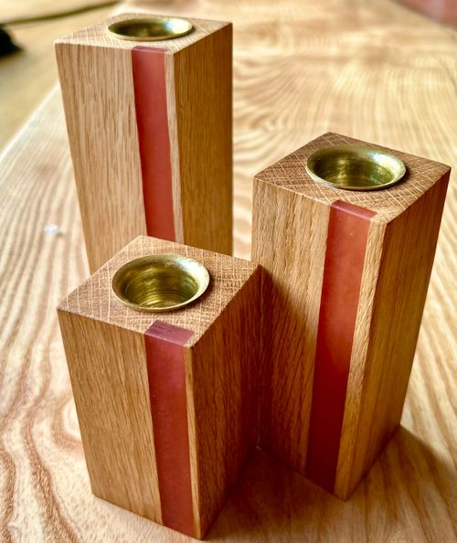 Trio of english hardwood candlesticks