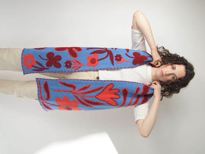 Swinbrook Scarf – ClematisIntroducing the Floral Statement Scarf – the epitome of vibrant charm and artistic expression.
