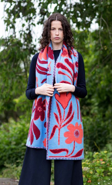 Swinbrook Scarf – ClematisIntroducing the Floral Statement Scarf – the epitome of vibrant charm and artistic expression.