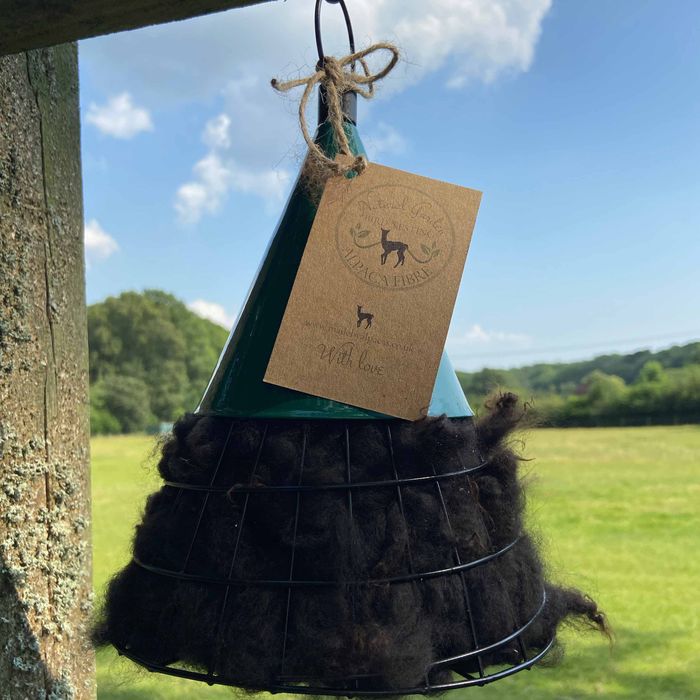 Pyramid bird nesting hanger filled with British Alpaca Fibre