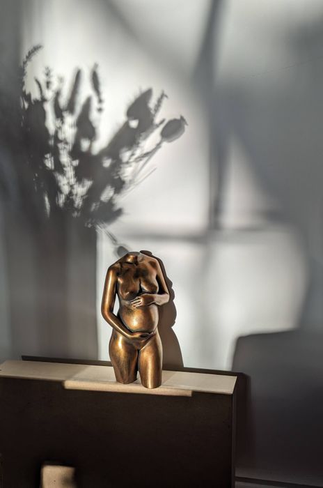 Antique bronze pregnancy sculpture