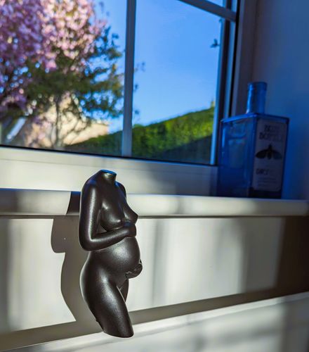 Pregnancy sculpture in black