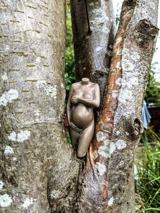 sculpture in aged bronze