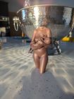 sculpture in polished copper