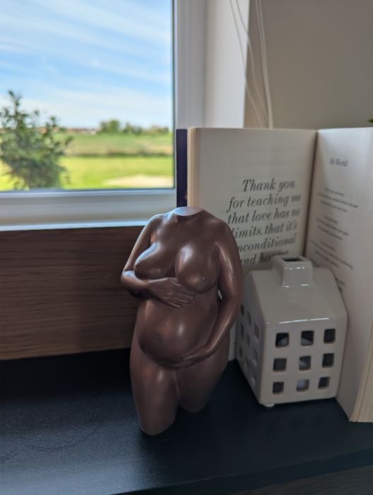 sculpture in polished copper