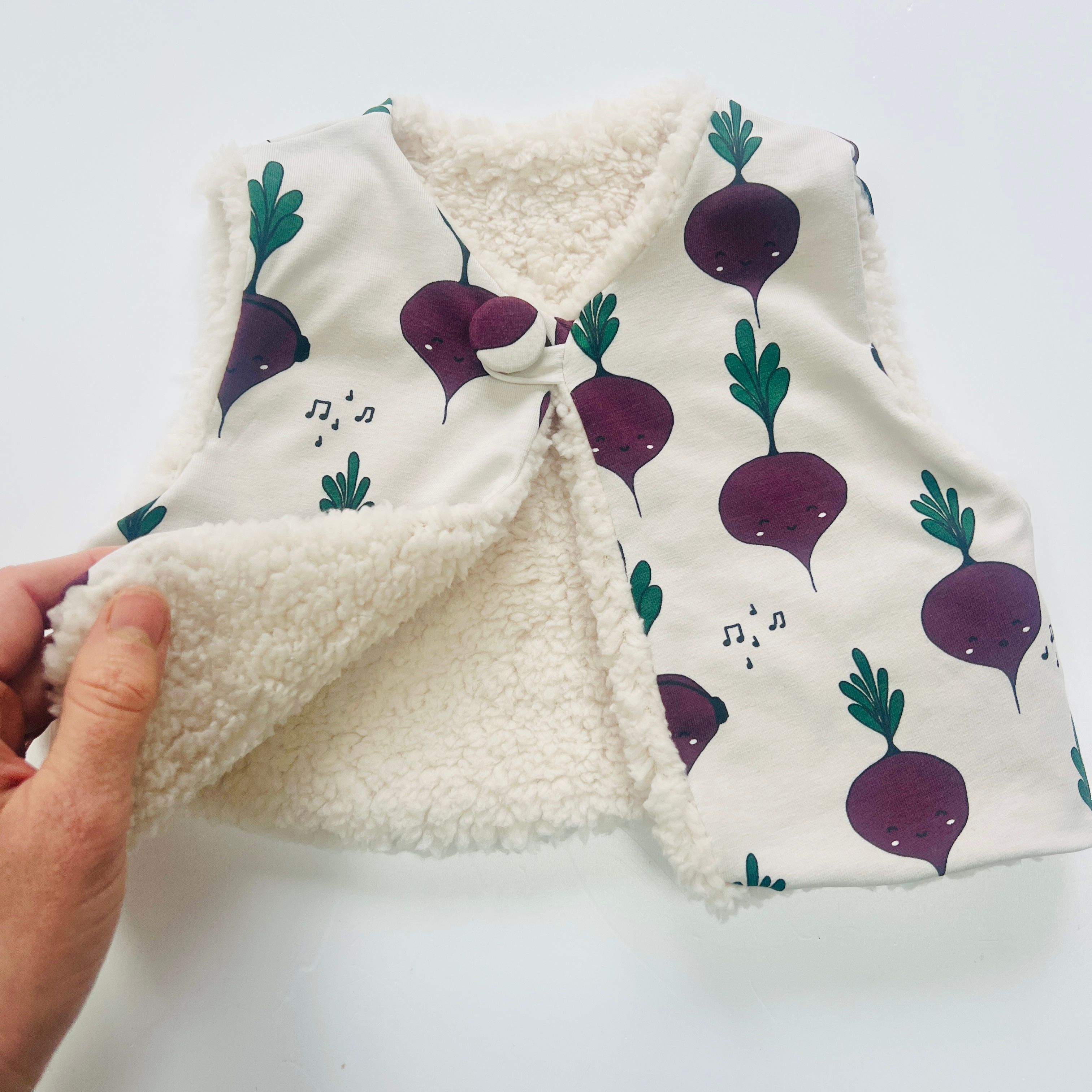 Beetroot Fully Reversible fleecy gilet with covered button
