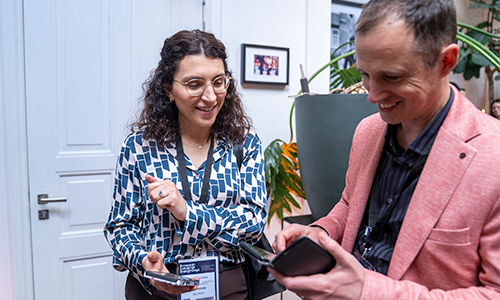 EIED exhibitors looking at their checklist