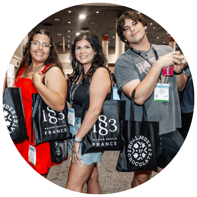 Coffee Fest attendees with bags
