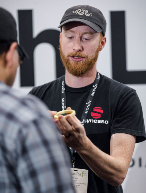 Synesso technician teaching session in the Tech Lab at Coffee Fest