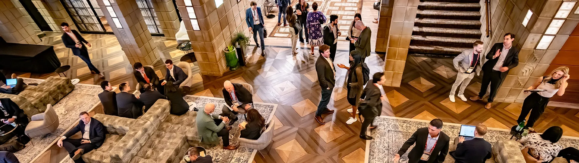 Business professionals networking in a lobby