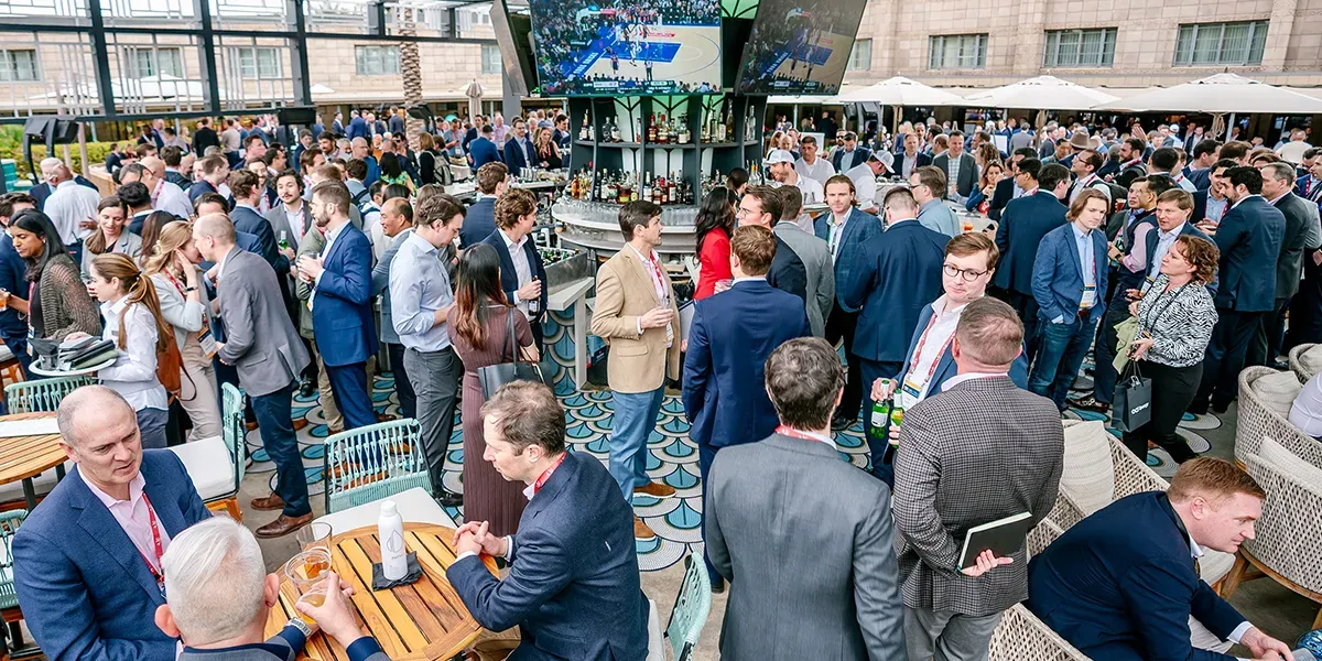 Business professionals mingling at the bar area