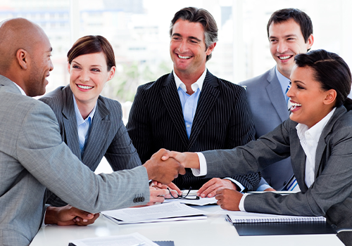 Professionals networking around a table