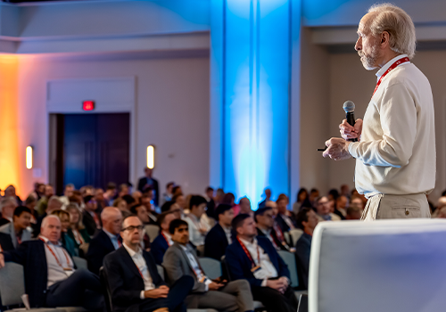 Speaker giving a presentation to the audience