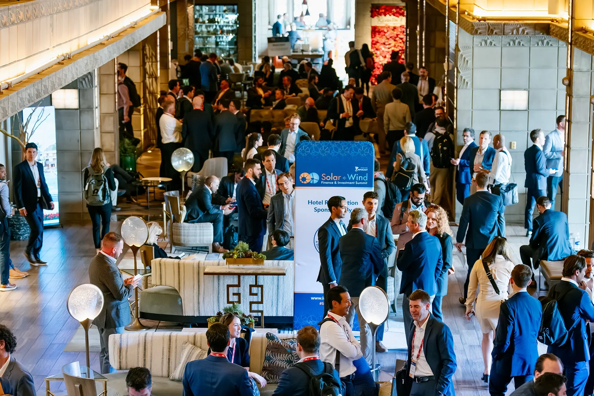 Networking attendees in the lobby of the venue