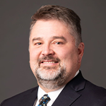 Speaker profile image for John Hammond