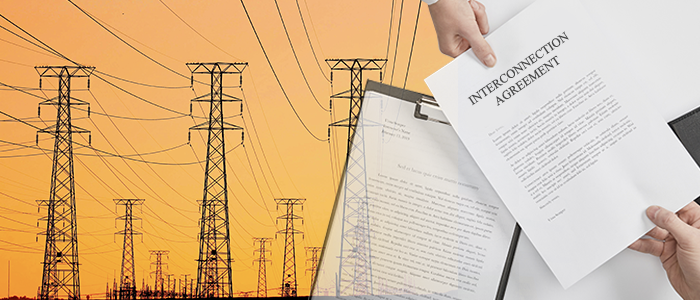 An image of tranmission towers and a person passing an Interconnection Agreement document to another person