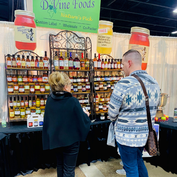 Exhibitor talking to buyer