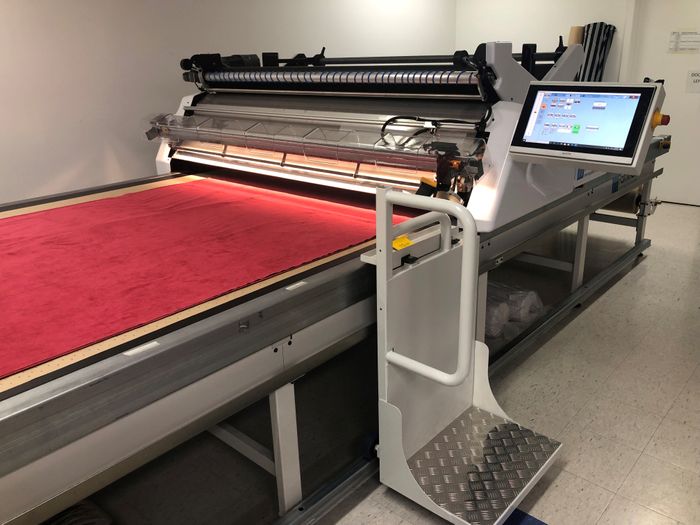 Automatic Fabric Spreading and Fabric Cutting machine //Gerber