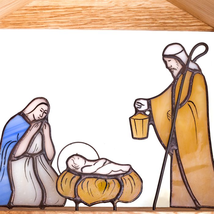 Stained Glass Nativity Scene in Wooden Stable