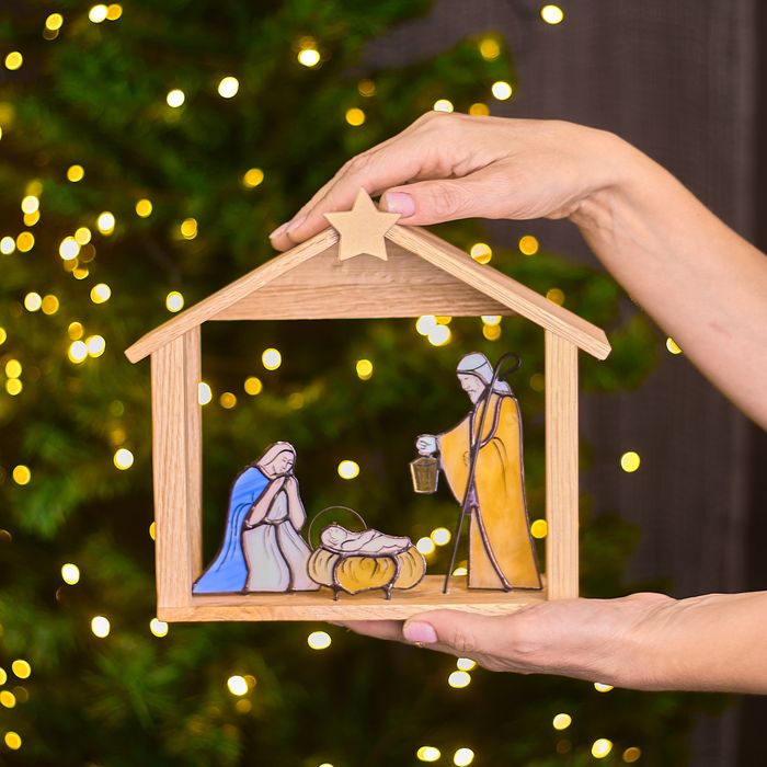 Stained Glass Nativity Scene in Wooden Stable