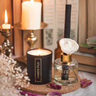 Exhibitor profile image for Amber Hue Candles