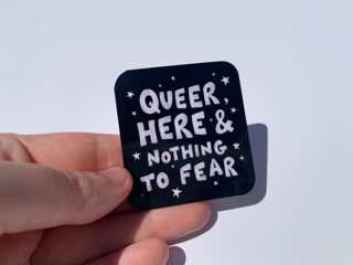 Queer and here sticker