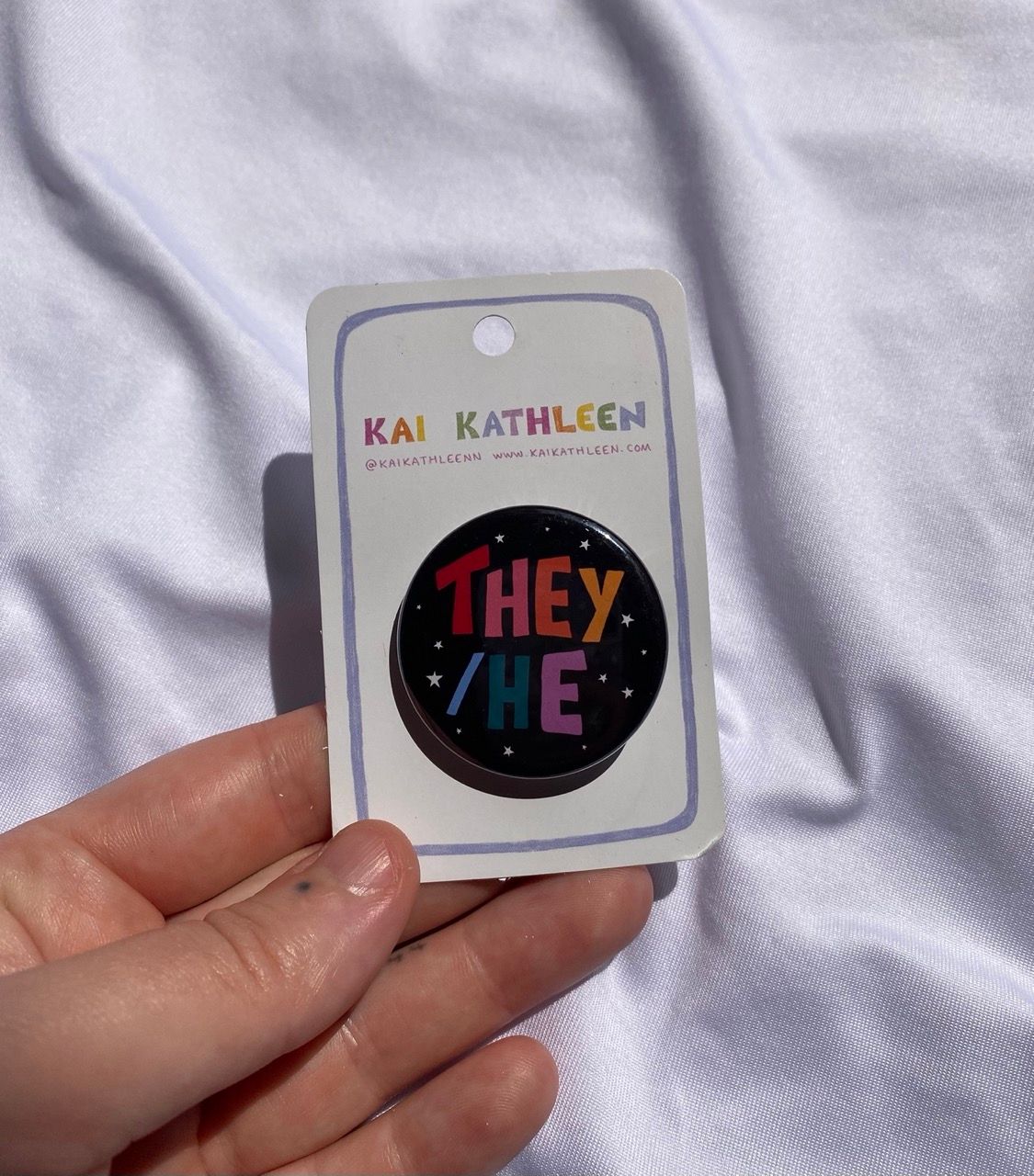 They/he pronoun badge