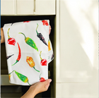 Chilli 'Splash of Spice' Tea Towel printed and designed in the UK by Sarah Epsom