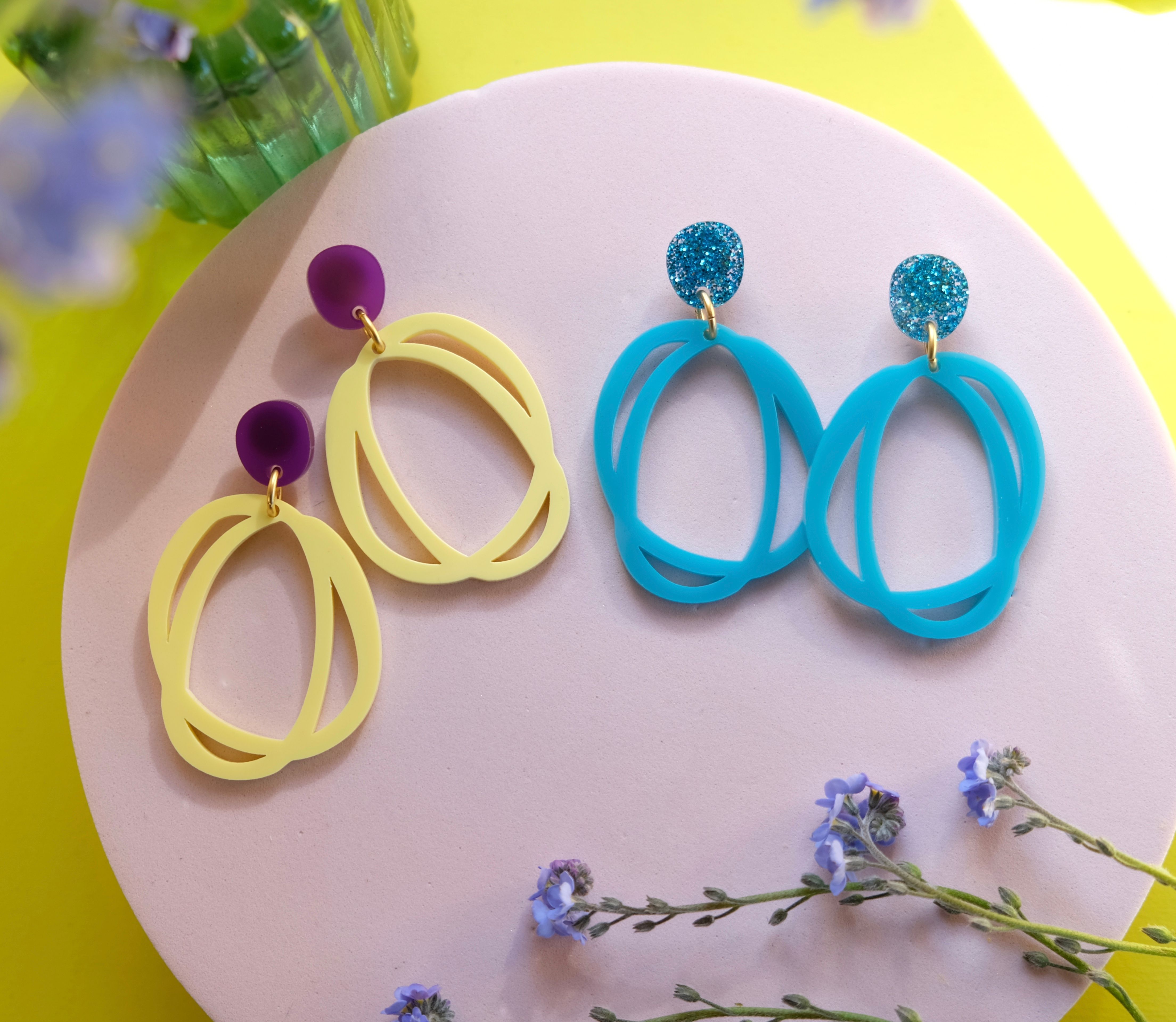 CMAT dangly earrings