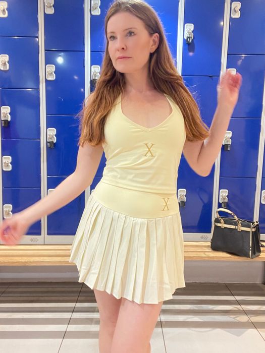 PadelXElite Butter Yellow Halter & Pleated Skort – Worn by Lucy Chapman