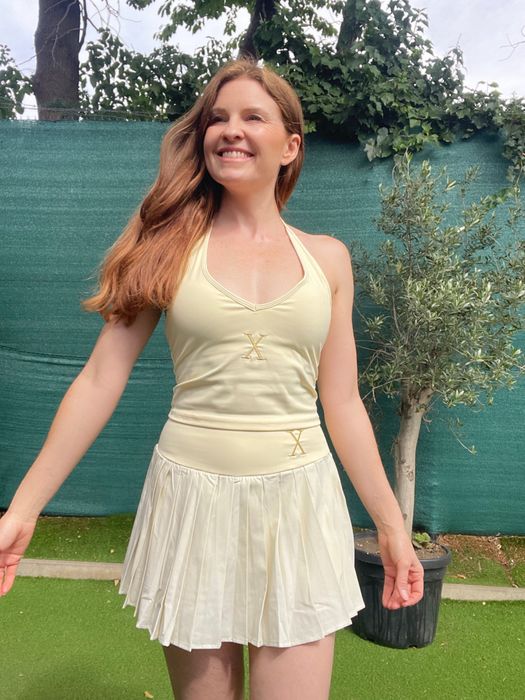PadelXElite Butter Yellow Halter & Pleated Skort – Worn by Lucy Chapman