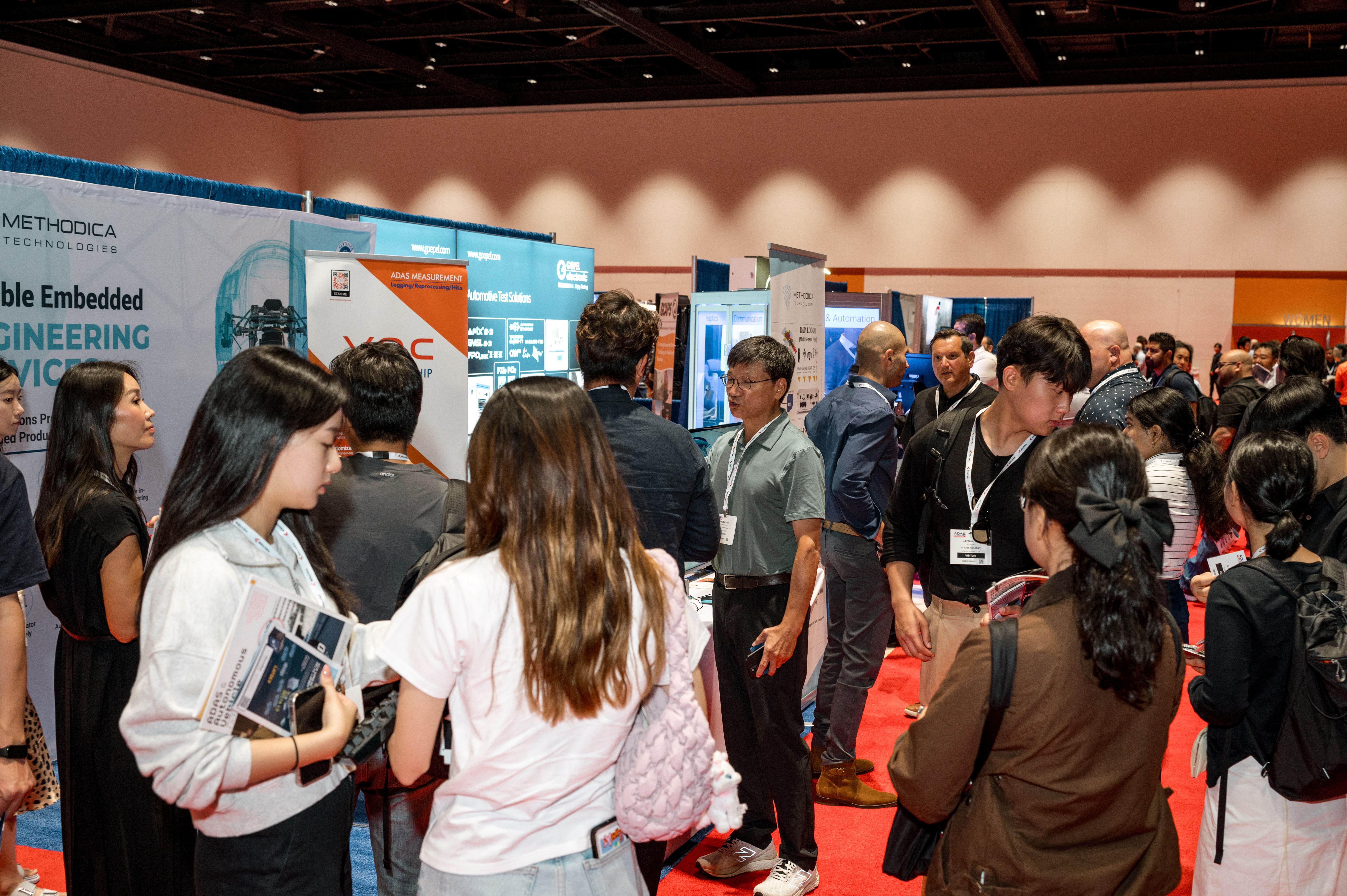 Photo shows visitors networking at ADAS California