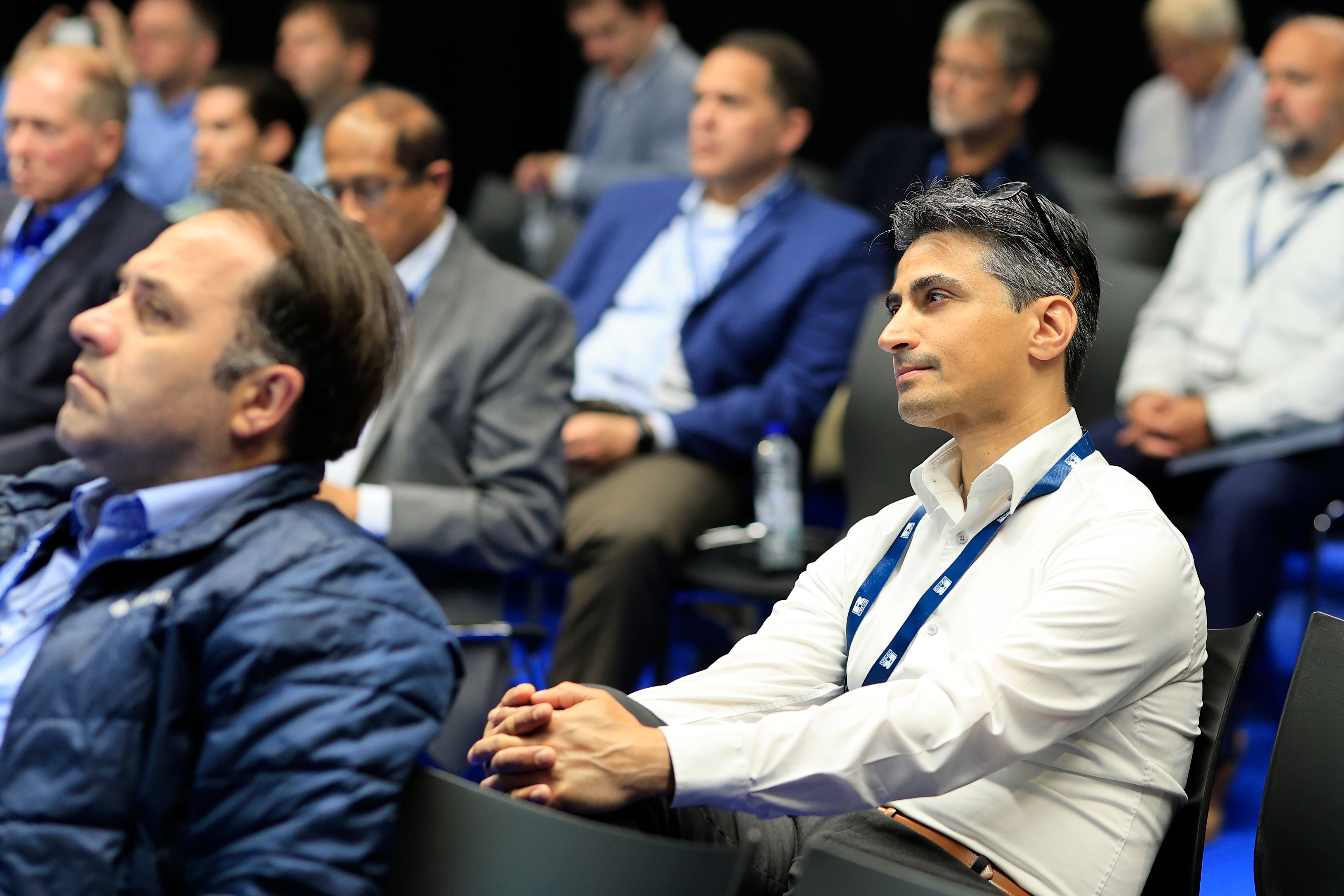 Photo shows a speaker at Electric & Hybrid Marine Conference