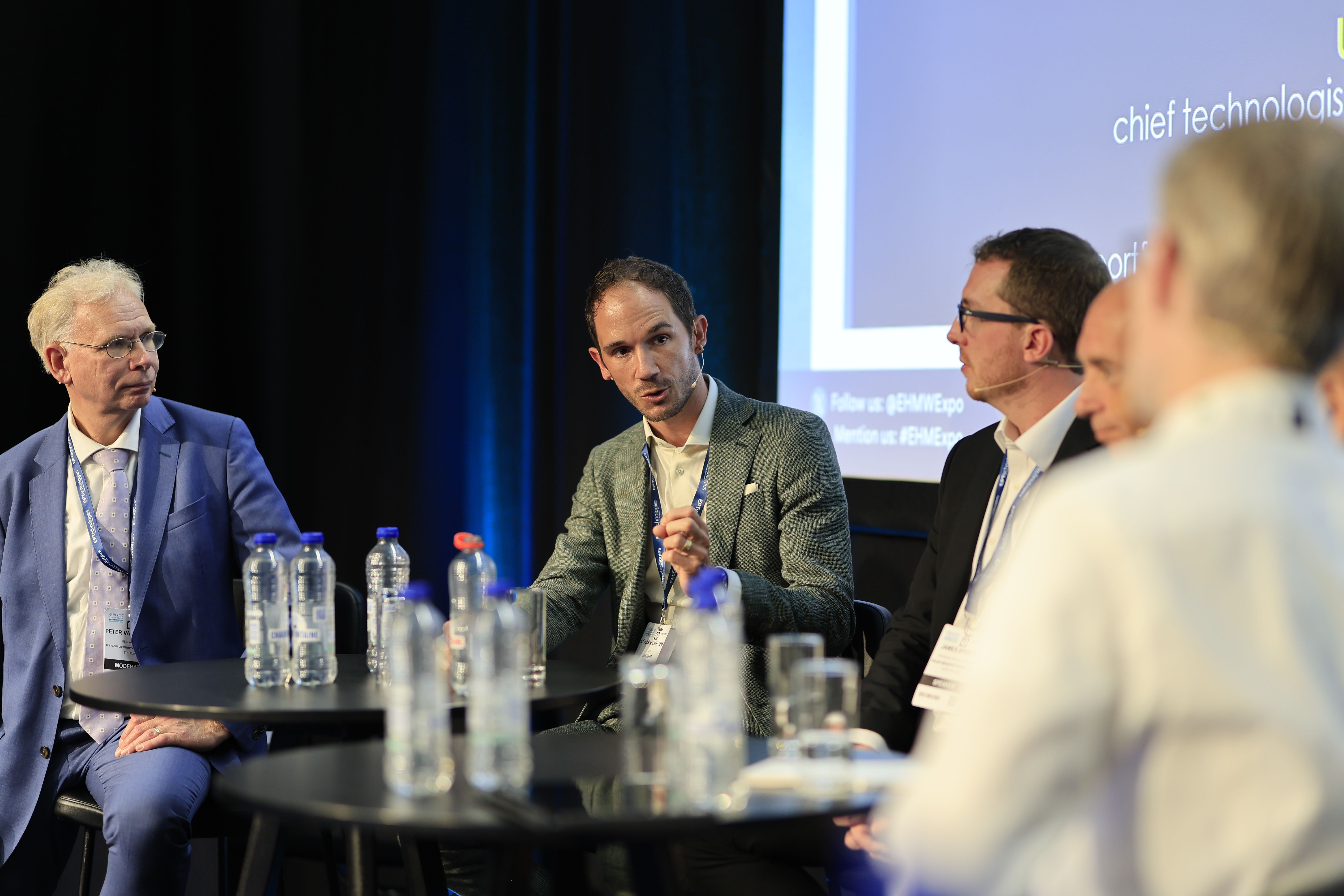 Photo shows a panel of experts at Advanced Maritime Technology conference