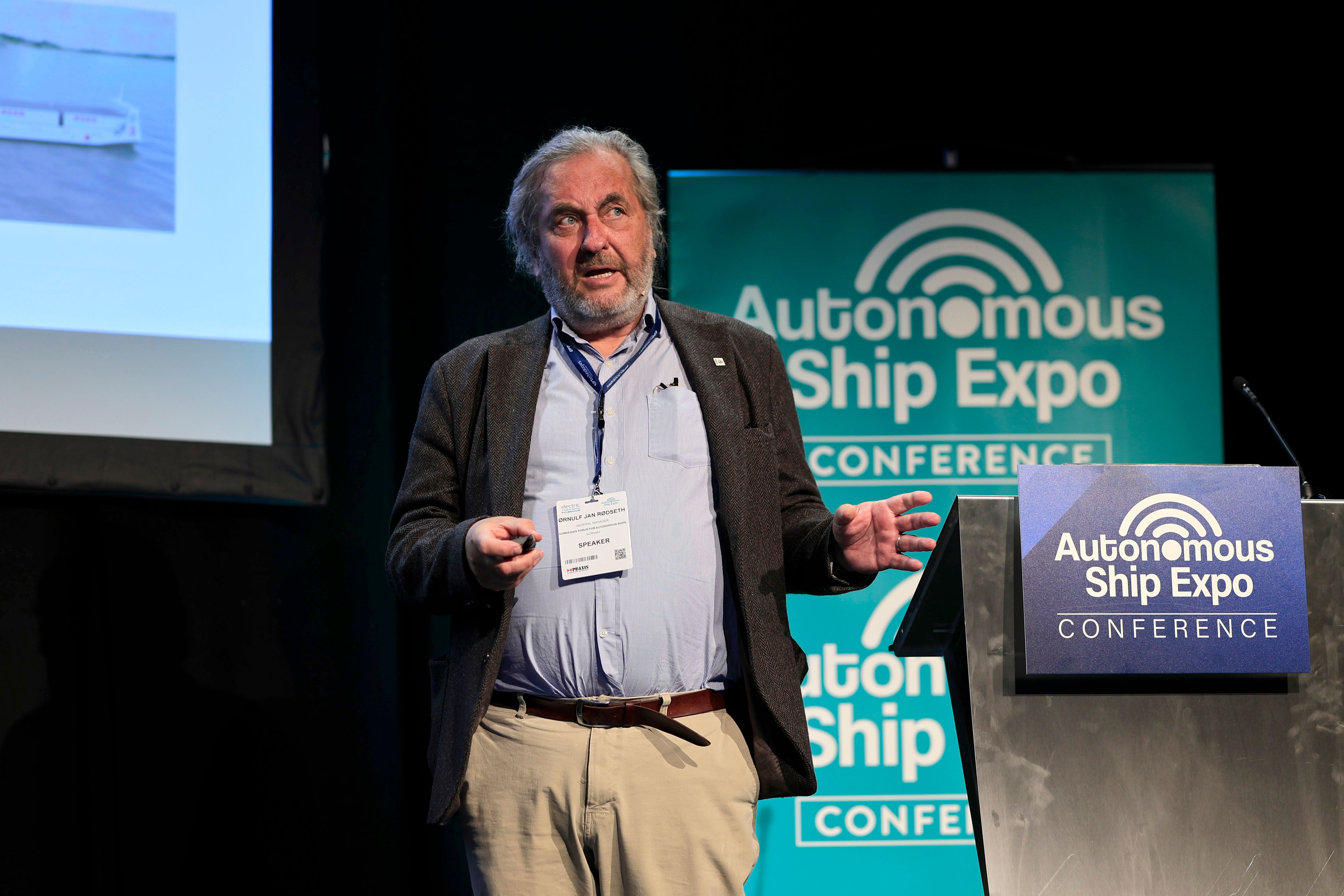 Photo shows a speaker at Autonomous Ship Expo conference